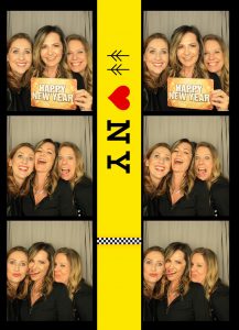 Three women on a photo booth photo