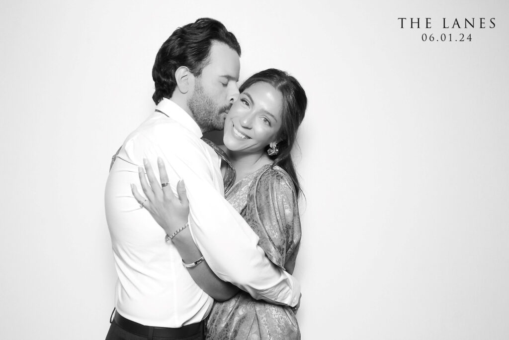 Man kissing women on a cheek