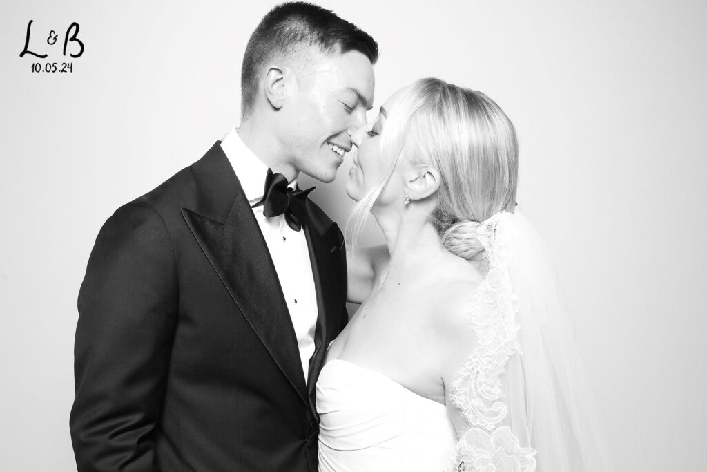 Kssing bride and groom