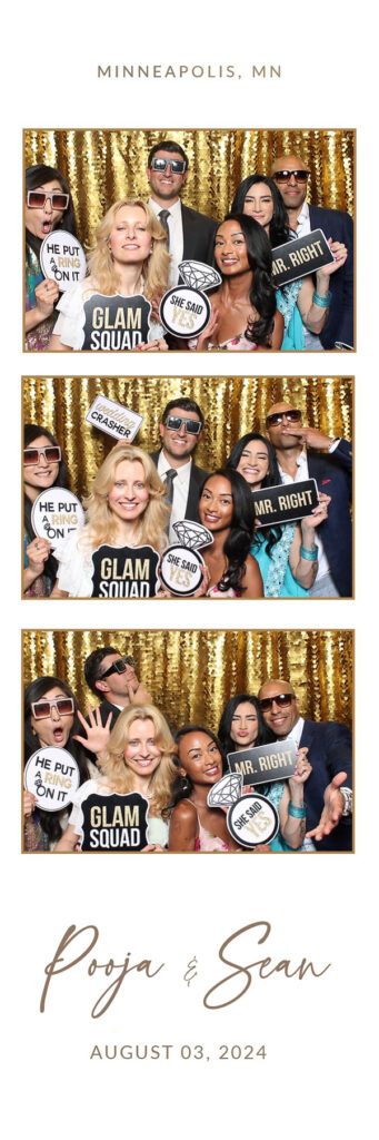 Group of people posing with signs